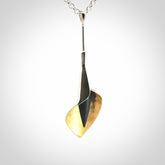 Sterling Silver drop pendant with Black Jade centre and Gold Plated interior. Provided with a sterling silver chain.